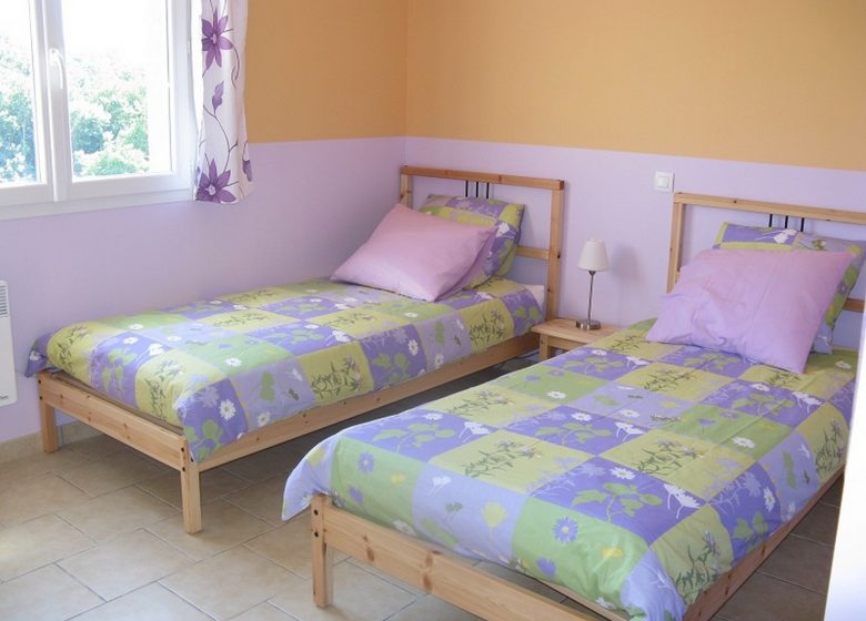 Gite-Tournesols-bedroom-2-beds NAILLOUX